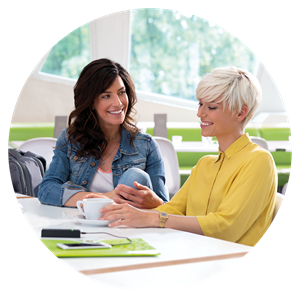 Women talking in meeting